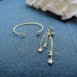 Pura Vida gold star and moon cuff bracelet and earrings set.  Never worn.